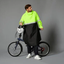 BTWIN PONCHO PLUIE VISIBILITE JOUR NUIT 560 NOIR JAUNE FLUO 15 BTWIN PONCHO PLUIE VISIBILITE JOUR NUIT 560 NOIR JAUNE FLUO -Vélotaf Magasin poncho pluie visibilite jour nuit 560 noir jaune fluo 3